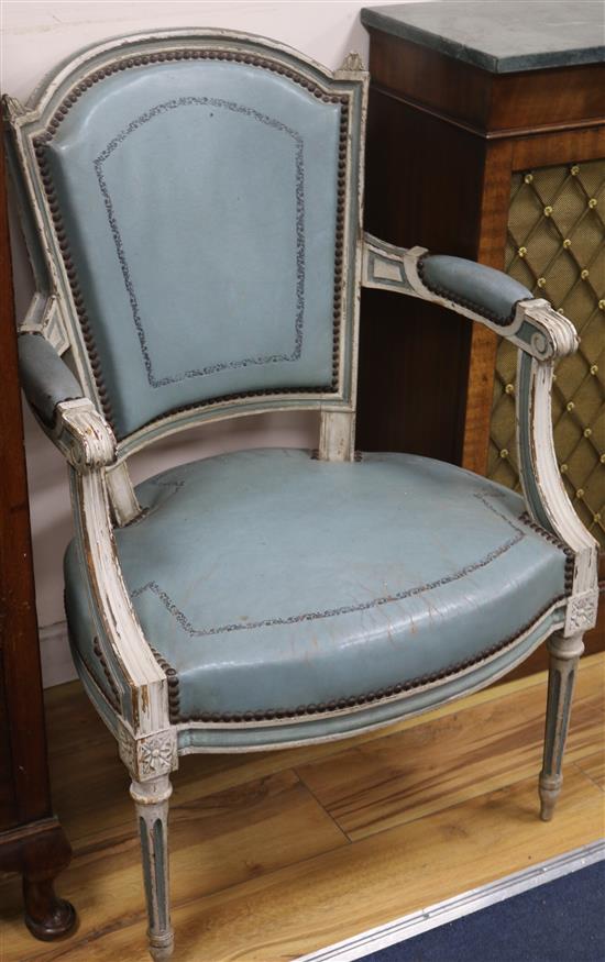 A pair of chairs in blue leather